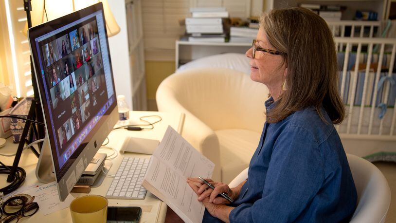 Nancy McGuirk talks with the leaders of her women's Bible study class during a Zoom call at her Atlanta home Monday, March 15, 2021.  (Steve Schaefer for The Atlanta Journal-Constitution)