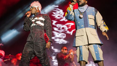 Andre “Andre 3000” Benjamin, left, and Antwan “Big Boi” Patton, right, of Outkast perform at the 2014 Austin City Limits music festival on Fri., Oct. 10, 2014 at Zilker Park in Austin, TX. Ashley Landis for American-Statesman