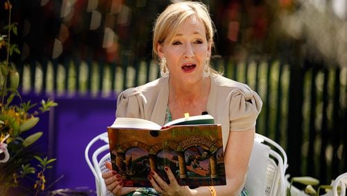 WASHINGTON - APRIL 05: British author J.K. Rowling, creator of the Harry Potter fantasy series, points to the place on her forehead where her title character has a scar while reading "Harry Potter and the Sorcerer's Stone" during the Easter Egg Roll on the South Lawn of the White House April 5, 2010 in Washington, DC. About 30,000 people are expected to attend attended the 132-year-old tradition of rolling colored eggs down the South Lawn of the White House. (Photo by Chip Somodevilla/Getty Images)