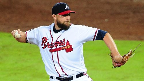 Veteran closer Jim Johnson signed a two-year contract extension with the Braves on the final day of the season Sunday.