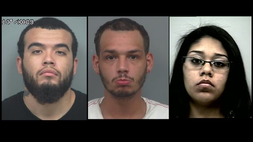 (from left) Marlon Torres, Juan Johnny Marrero and Iris Lizeth Torres have each been charged with 13 counts of identity fraud and 13 counts of computer invasion of privacy.