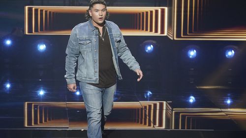 Caleb Kennedy made the top 5 on "American Idol" May 9, 2021 but was cut after a video surfaced online with him seated next to someone with a KKK hood. (ABC/Eric McCandless)