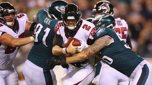 PHILADELPHIA, PA - SEPTEMBER 06:  Matt Ryan #2 of the Atlanta Falcons is sacked by Chris Long #56 of the Philadelphia Eagles during the fourth quarter at Lincoln Financial Field on September 6, 2018 in Philadelphia, Pennsylvania.  (Photo by Mitchell Leff/Getty Images)