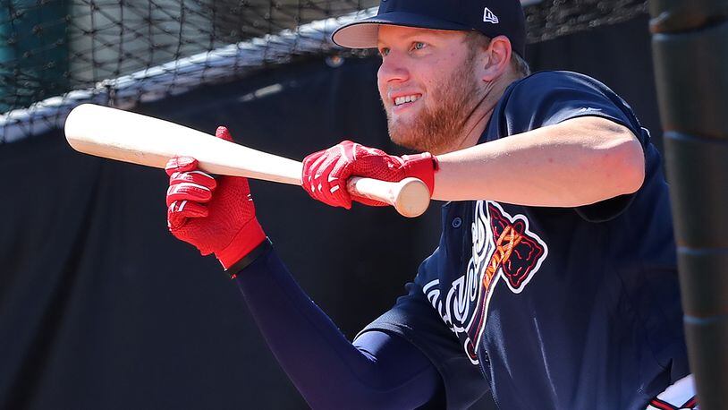 Dustin Peterson is making a bid for a roster spot, though it’s his power, not bunting, that’s made him a viable candidate.   Curtis Compton/ccompton@ajc.com