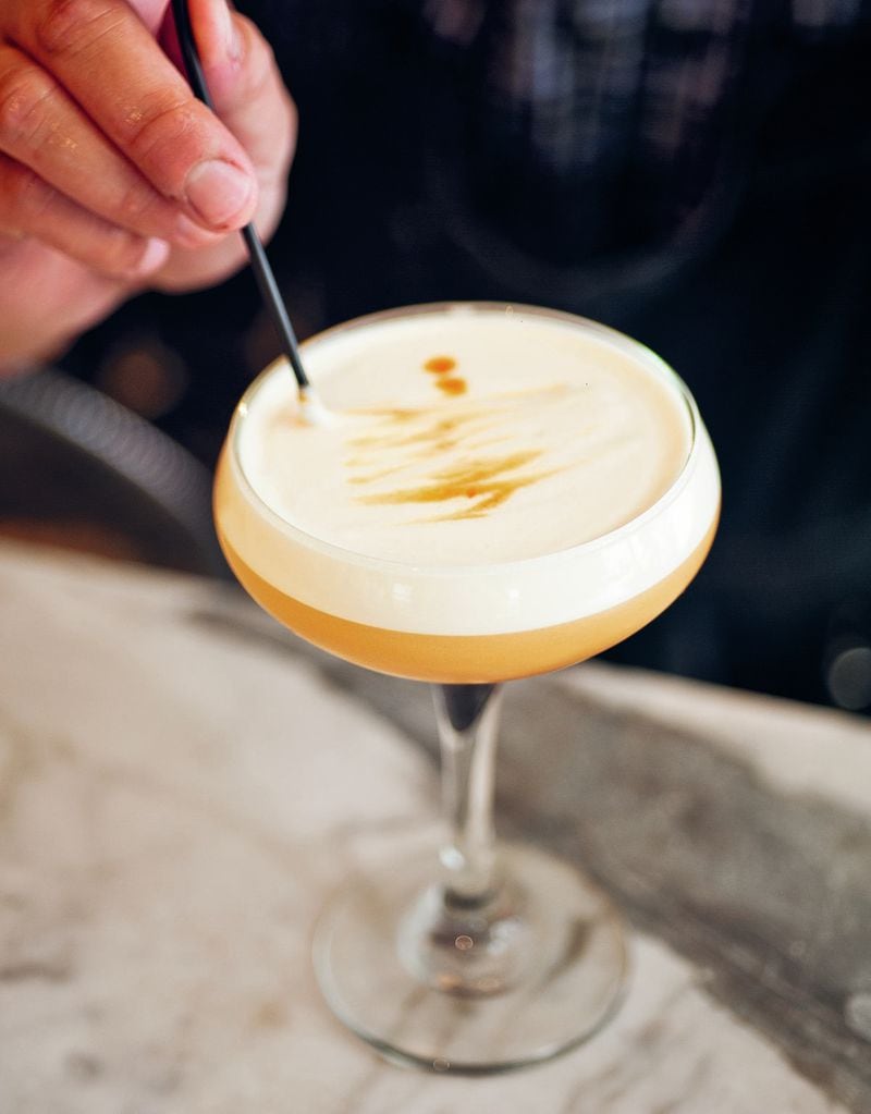 If you like, you can get decorative with the foam on the Tokyo Sour. Reprinted with permission from “The Peached Tortilla” © 2019 Eric Silverstein. Published by Sterling Epicure. CONTRIBUTED BY CARLI RENE / INKED FINGERS
