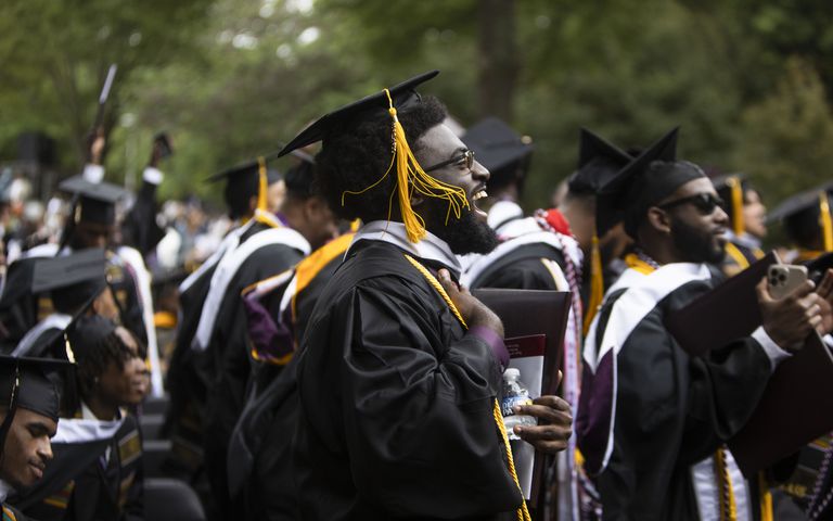 Chance "Mercury" Hall cheers during the Morehouse College commencement ceremony on Sunday, May 21, 2023, on Century Campus in Atlanta. The graduation marked Morehouse College's 139th commencement program. CHRISTINA MATACOTTA FOR THE ATLANTA JOURNAL-CONSTITUTION