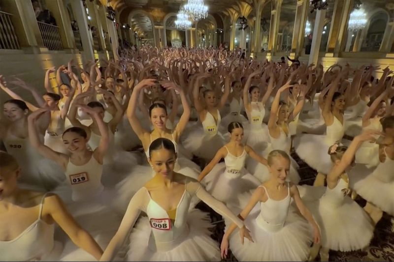 This image taken from video shows hundreds of young dancers performing in the Plaza Hotel, Wednesday, April 17, 2024, in New York, to break the world record for dancing on pointe in one place. The spectacle was organized by Youth America Grand Prix, a ballet scholarship program that is celebrating its 25th anniversary with three nights of performances at the Lincoln Center for the Performing Arts. (AP Photo)