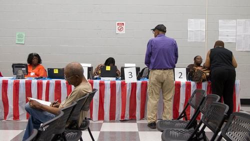 People take part in Saturday early voting at the C.T. Martin Natatorium and Recreation Center in Atlanta, Georgia, on Saturday, May 12, 2018. (REANN HUBER/REANN.HUBER@AJC.COM)