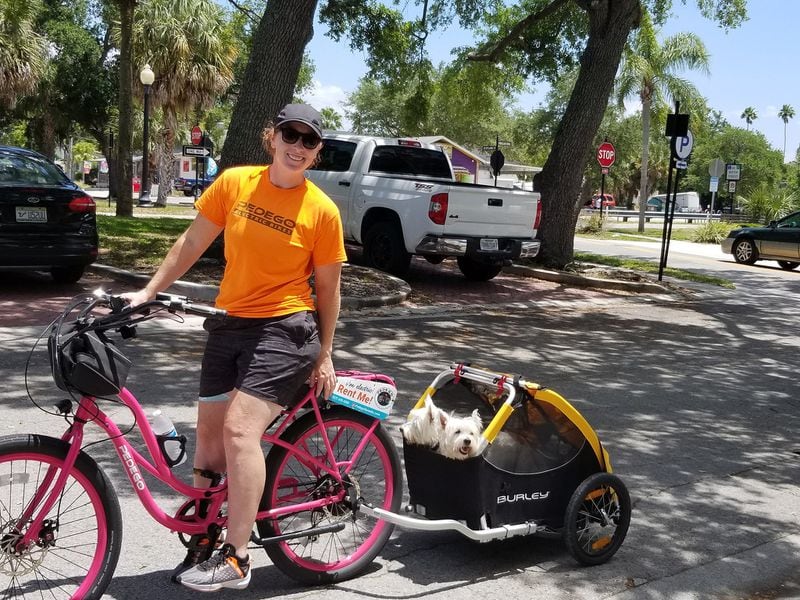 Caroline Harbaugh, owner of Pedego Electric Bikes, guides bike rides through Dunedin, Florida. Contributed by Wesley K.H. Teo