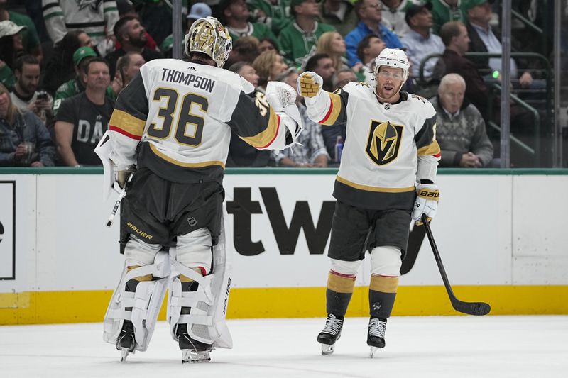 Vegas Golden Knights right wing Jonathan Marchessault, right, celebrates his first period goal with goaltender Logan Thompson (36) during Game 2 of an NHL hockey Stanley Cup first-round playoff series against the Dallas Stars in Dallas, Wednesday, April 24, 2024. (AP Photo/Tony Gutierrez)