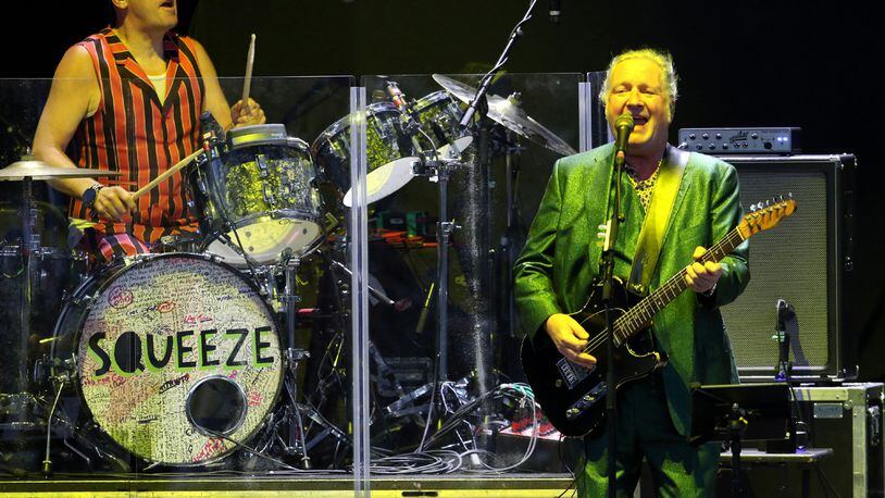 Squeeze perform "Tempted" as the Brit-pop band opened the concert with a one-hour set Friday, September 24, 2021, at Ameris Bank Amphitheatre in Alpharetta. Then Hall & Oates performed many of their pop duo classic hits. (Photo: Robb Cohen for The Atlanta Journal-Constitution)