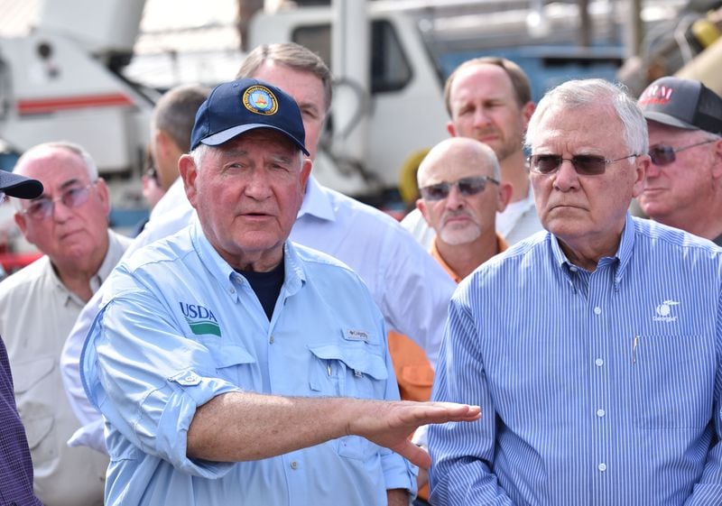October 16, 2018 Bainbridge - Secretary of Agriculture Sonny Perdue speaks as Governor Nathan Deal looks at Flint River Mills in Bainbridge on Tuesday, October 16, 2018. Vice President Mike Pence touched down in this Southwest Georgia city Tuesday and addressed the Sunbelt Agricultural Exposition in Moultrie as he surveyed storm damage from Hurricane Michael. Penceâs visit comes a day after President Donald Trump and First Lady Melania Trump traveled through the central part of the Peach State and met with farmers. HYOSUB SHIN / HSHIN@AJC.COM