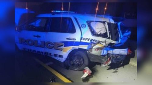 A Chamblee police officer's patrol vehicle was hit by a car Tuesday morning.
