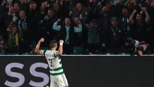 Celtic's Giorgos Giakoumakis celebrates after scoring the opening goal during the Champions League Group F soccer match between Celtic and Shakhtar Donetsk at Celtic park, Glasgow, Scotland, Tuesday, Oct. 25, 2022. (AP Photo/Scott Heppell)