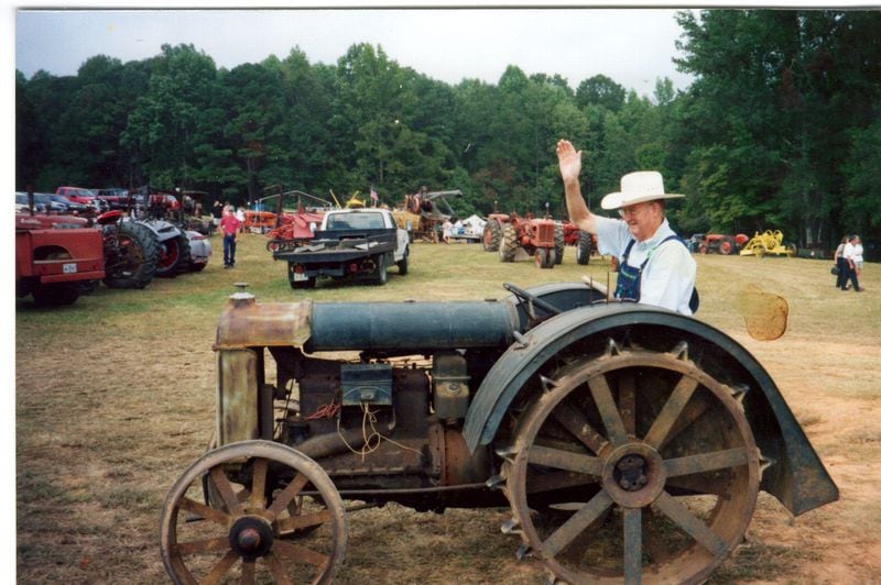Georgia Agriculture Commissioner, Tommy Irvin, is on a 1924 Fordson tractor at last year's Inman Farms Heritage Days Festival. SPECIAL 9/14/00
