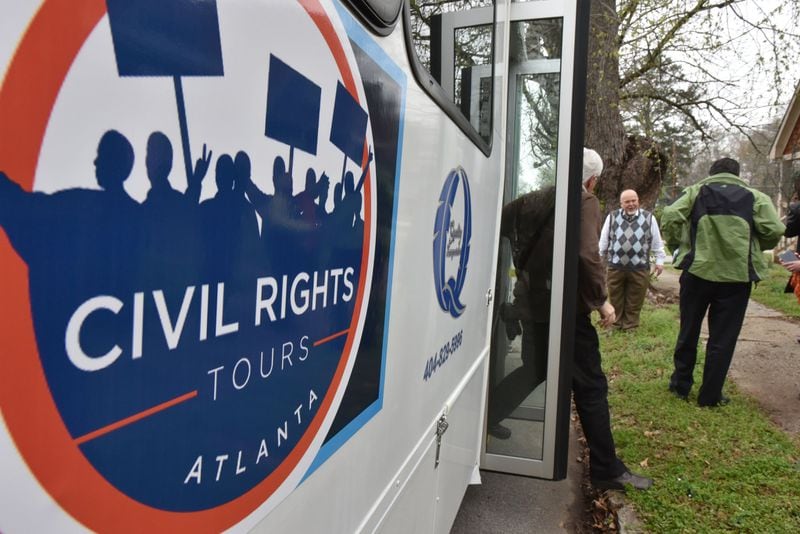 Civil Rights Tour: members of the press get off the bus to view up close the house where Martin Luther King Jr. lived at the time of his assassination. Hyosub shin / hshin@ajc.com