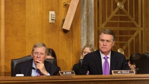 Georgia U.S. Sens. Johnny Isakson, left, and David Perdue at a Senate Foreign Relations Committee hearing in 2015. Senate Photography Office.
