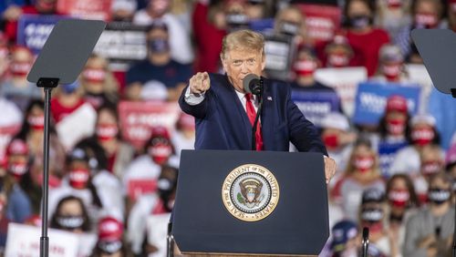 President Donald Trump, shown speaking at a rally earlier this month at Middle Georgia Regional Airport in Macon, is preparing to make another campaign stop in Georgia on Sunday with a visit to Rome.  (Alyssa Pointer / Alyssa.Pointer@ajc.com)