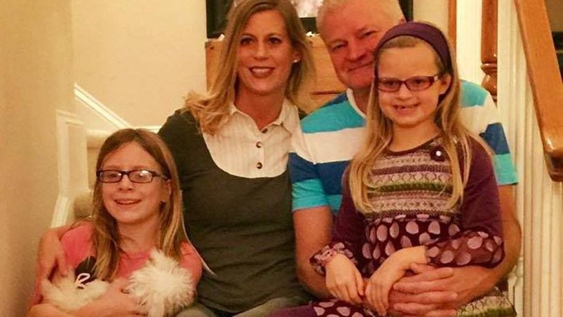 Brent Patterson and Kathy Patterson at home with their daughters, Kayla and Madelyn, in an undated image posted on Facebook.