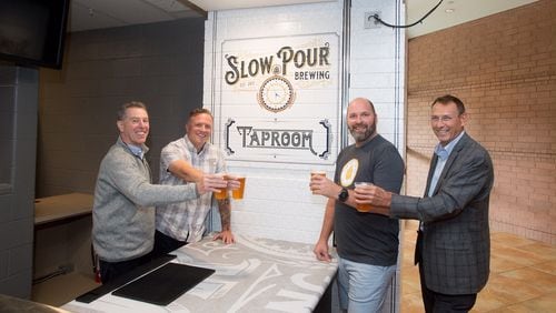 Slow Pour Brewing has opened a branded taproom in the Infinite Energy Arena as part of a new partnership with the Infinite Energy Center.