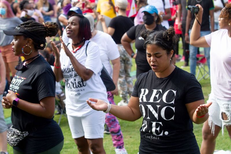 A large crowd gathers at the Centennial Olympic Park stage for an OneRace prayer and worship before marching to the State Capitol June 19, 2020. STEVE SCHAEFER FOR THE ATLANTA JOURNAL-CONSTITUTION