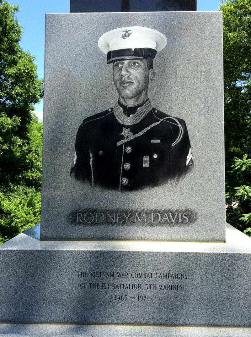 An obelisk featuring the likeness of Sgt. Rodney M. Davis is erected at a small cemetery in Macon. Davis is buried adjacent to the monument. Courtesy of Picasa