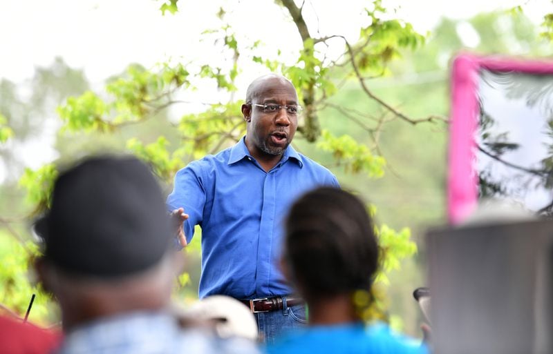 U.S. Sen. Raphael Warnock speaks to Black farmers who gathered earlier this month at Jibb's Vineyard in Byromville. (Hyosub Shin / Hyosub.Shin@ajc.com)