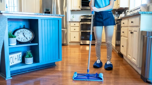 A MaidPro cleaner moves through a client's kitchen. The company, which opens its fourth Atlanta-area franchise on Friday, says it has enough demand to hire 25% more workers.