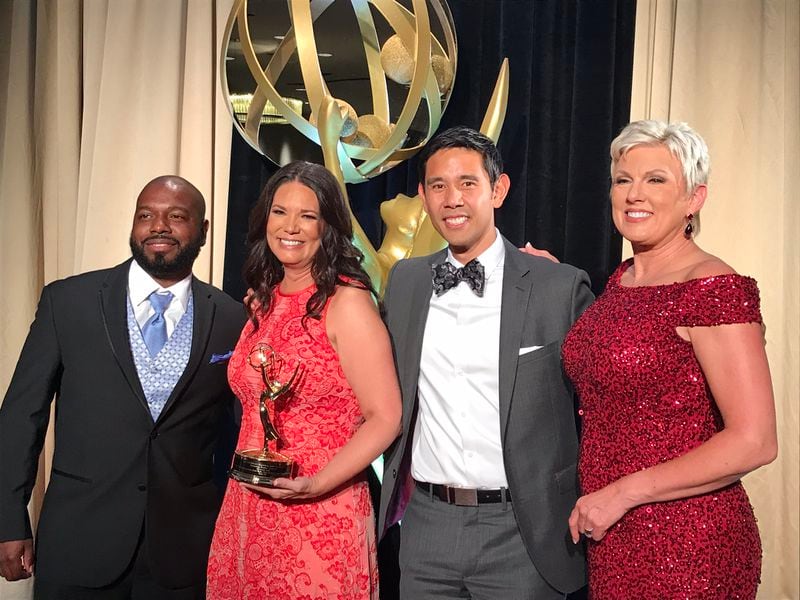 (L-R) Dante Tinsley, Misti Turnbull, Chris Jose and Karen Minton pose after Channel 2 Action News won the best weather newscast covering Hurricane Irma.