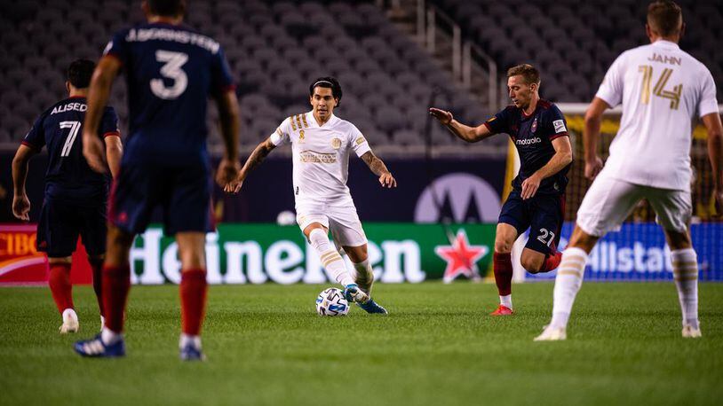 Atlanta United's Franco Escobar (2) dribbles through a gauntlet of Chicago Fire players Sunday, Sept. 27, 2020, at Soldier Field in Chicago. The Fire won 2-0. (Atlanta United)