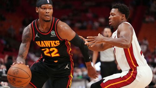 Cam Reddish #22 of the Atlanta Hawks drives to the basket against the Kyle Lowry #7 of the Miami Heat during a preseason game at FTX Arena on Oct. 4, 2021 in Miami, Florida. (Mark Brown/Getty Images/TNS)