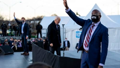 President-elect Joe Biden, center, while campaigning for Democratic Senate candidates Jon Ossoff, left, and the Rev. Raphael Warnock, right, in Atlanta on Monday, Jan. 4, 2021. After both won Senate seats, Biden told supporters he was “more optimistic than ever.” (Doug Mills/The New York Times)