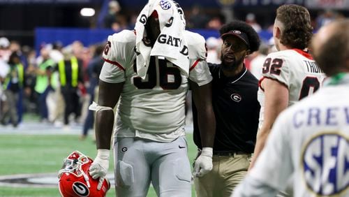 Georgia defensive lineman Zion Logue (93) reacts as he walks off of the field after their 27-24 loss to Alabama in the SEC Championship game at Mercedes-Benz Stadium, Saturday, December. 2, 2023, in Atlanta. (Jason Getz / Jason.Getz@ajc.com)