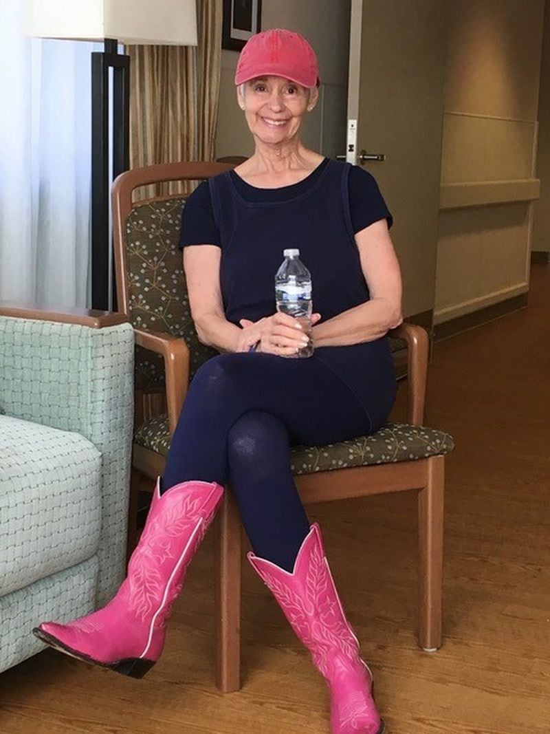 Bonnie Ross-Parker of Atlanta dons her pink cap and signature pink boots during October, which is Breast Cancer Awareness Month. CONTRIBUTED