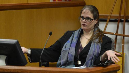 Elisabeth Murray-Obertein, former staff attorney for the state ethics commission, this week filed a whistleblower lawsuit claiming media comments by former commission executive secretary Holly LaBerge about her had so damaged her reputation that she is unable to find work. BRANT SANDERLIN /BSANDERLIN@AJC.COM .
