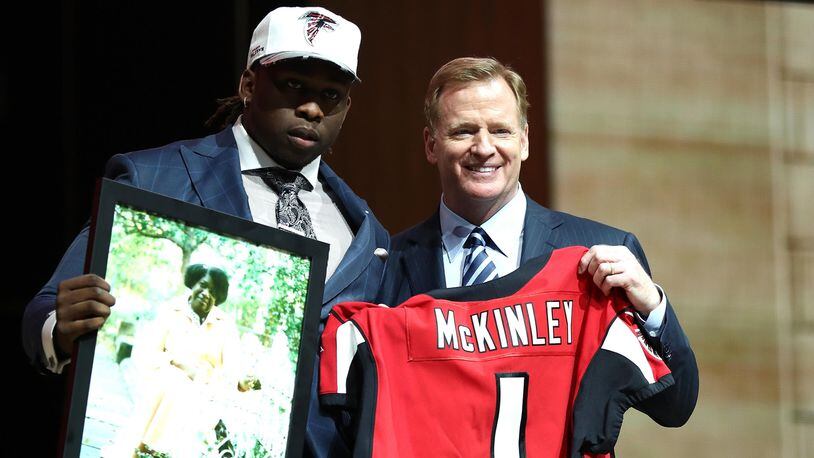 Takkarist McKinley of UCLA poses with NFL commissioner Roger Goodell after being picked #26 overall by the Falcons during the first round of the 2017 NFL Draft at the Philadelphia Museum of Art on April 27.
