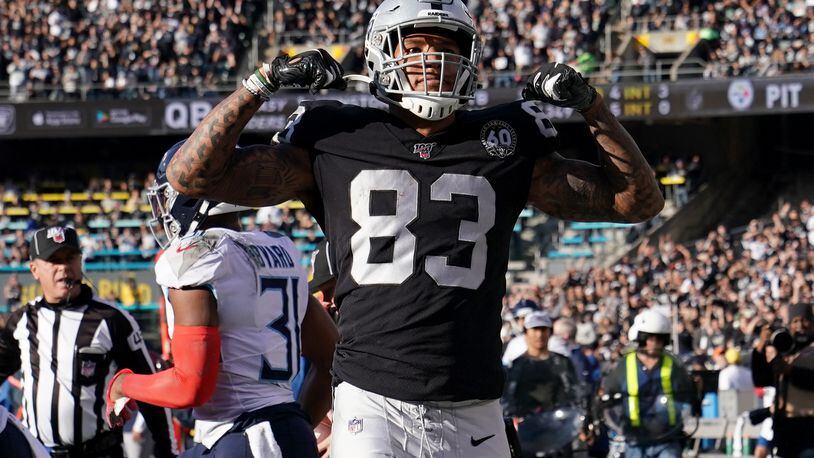 Look at me now: The Raiders Darren Waller flexes after a reception against Tennessee Sunday. (Photo by Thearon W. Henderson/Getty Images)