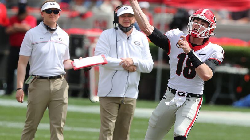 041721 Athens: Georgia head coach Kirby Smart (center) looks on as quarterback JT Daniels leads a touchdown drive against the Black Team during the G-Day Game at Sanford Stadium on Saturday, April 17, 2021, in Athens.   “Curtis Compton / Curtis.Compton@ajc.com”
