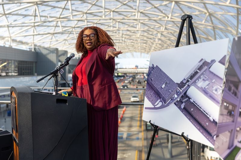 Jai Ferrell, the airport’s deputy general manager, speaks about construction affecting Hartsfield-Jackson Domestic Terminal the South and North parking decks in Atlanta on Friday, February 3, 2023. The displays show renderings of the South Parking Deck. (Arvin Temkar / arvin.temkar@ajc.com)