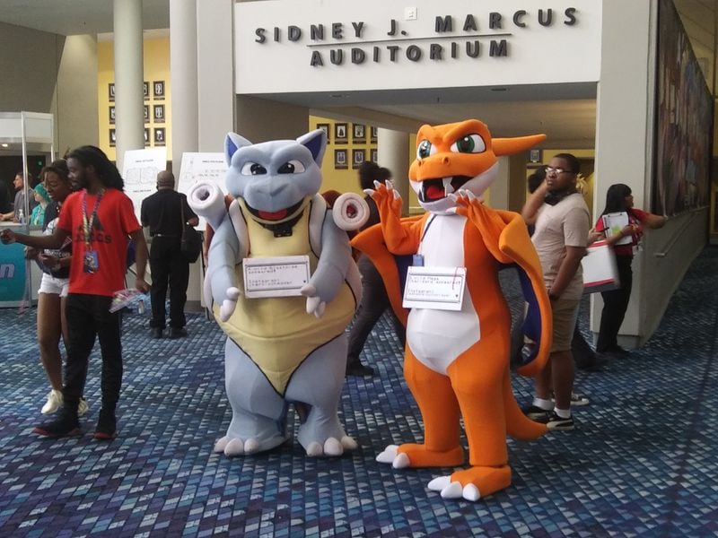 Costumes are encouraged at MomoCon. You’ll see everything from Pokemon to superheroes to animated favorites while walking through the exhibit hall.