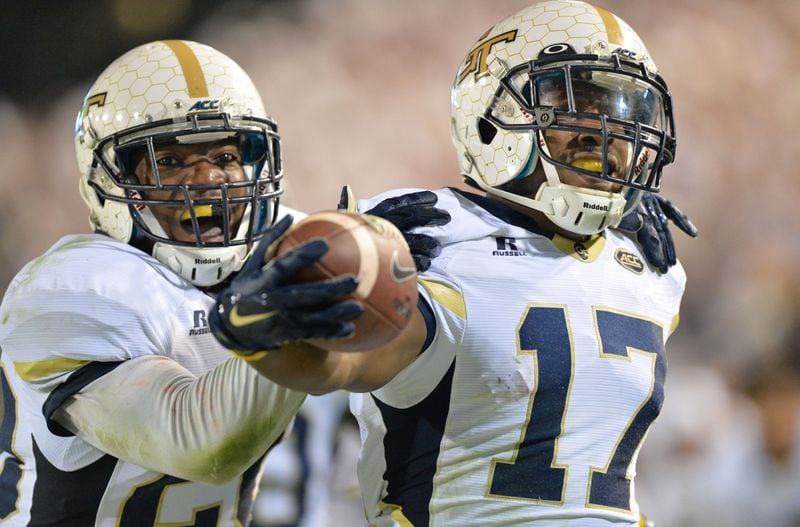 October 24, 2015 Atlanta - Georgia Tech Yellow Jackets defensive back Lance Austin (17) is celebrated by Georgia Tech Yellow Jackets defensive back Lawrence Austin after he scored a touchdown at the end of the fourth quarter at Bobby Dodd Stadium on Saturday, October 24, 2015. Georgia Tech Yellow Jackets won 22 - 16 against the Florida State Seminoles. HYOSUB SHIN / HSHIN@AJC.COM
