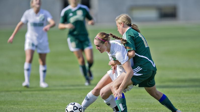 FILE PHOTO: Soccer is the most popular sport for girls in Georgia, with close to 10,500 girls playing at 400 high schools. A new study shows girls high school soccer players suffer concussions close to the same rate as high school football players.