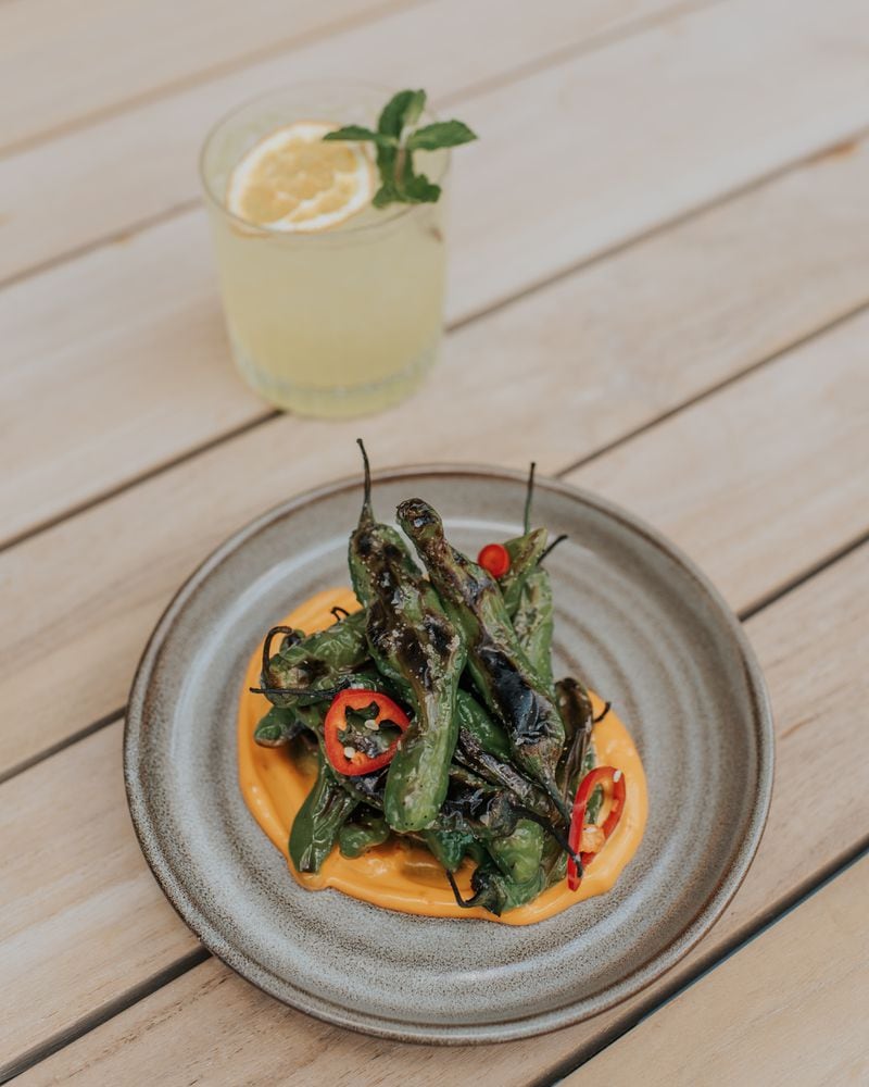 Drawbar offers a variety of shareable dishes, including blistered shishito peppers in a saffron aioli. (Courtesy of Caleb Jones Photography)