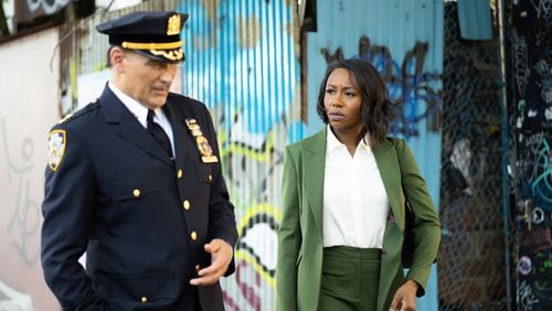 Pictured (L-R): Jimmy Smits as Chief John Suarez and Amanda Warren as Regina Haywood in CBS's "East New York."  Photo: Scott McDermott/CBS ©2022 CBS Broadcasting, Inc. All Rights Reserved.
