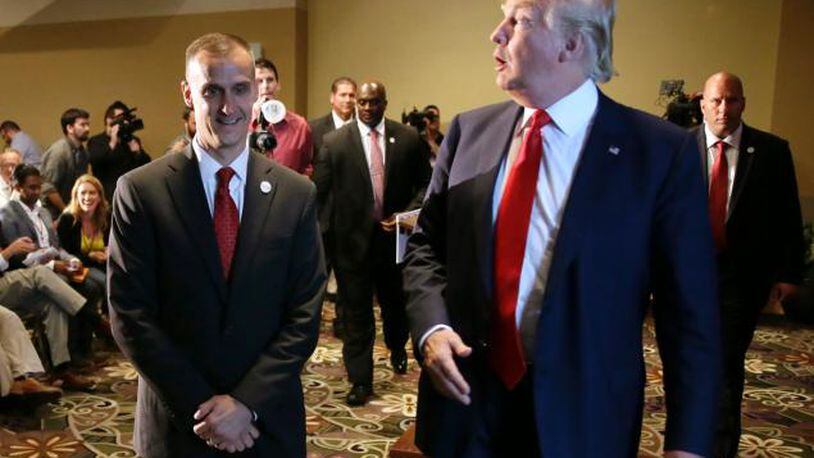 Corey Lewandowski, left, with his boss Donald Trump (AP)
