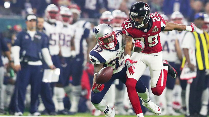 HOUSTON, TX - FEBRUARY 05: C.J. Goodwin #29 of the Atlanta Falcons breaks up a pass intended for Dion Lewis #33 of the New England Patriots in the third quarter during Super Bowl 51 at NRG Stadium on February 5, 2017 in Houston, Texas. (Photo by Tom Pennington/Getty Images)