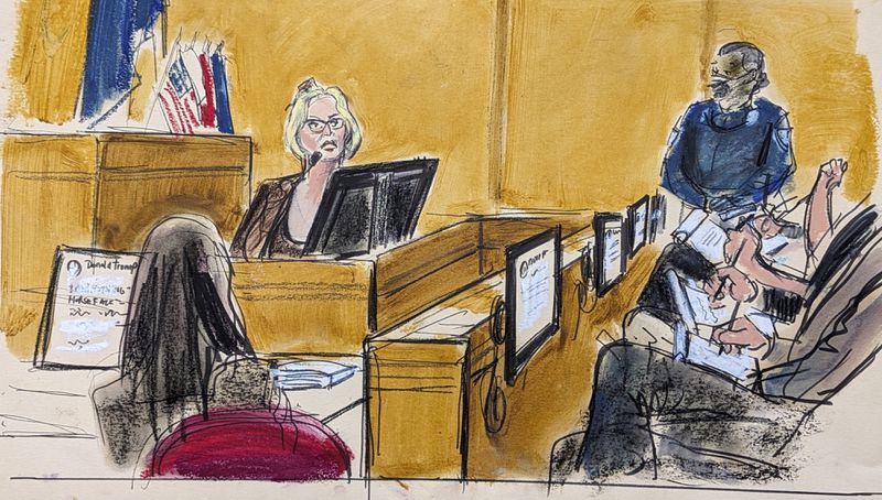 Jurors take notes as Stormy Daniels testifies in Manhattan criminal court, Tuesday, May 7, 2024, in New York, (Elizabeth Williams via AP)