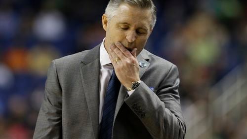 Georgia Tech head coach Brian Gregory reacts during the second half of an NCAA college basketball game against the Boston College in the first round of the Atlantic Coast Conference tournament in Greensboro, N.C., Tuesday, March 10, 2015. (AP Photo/Gerry Broome) Brian Gregory is 4-0 against Georgia but 19-51 in the ACC. (AP photo)
