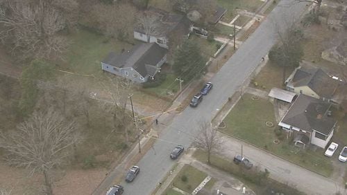 Homicide investigators were at the scene at Tiger Flowers Drive and Croesus Avenue in northwest Atlanta. (Credit: NewsChopper 2)