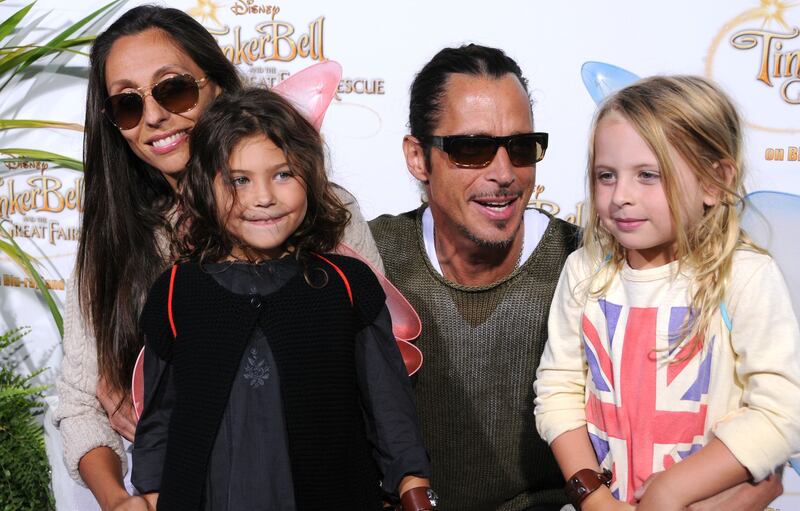 Rocker Chris Cornell, his wife Vicky Karayiannis and their children arrive at a special screening of "Tinker Bell And The Great Fairy Rescue" at La Cienega Park on August 28, 2010 in Beverly Hills, California. 